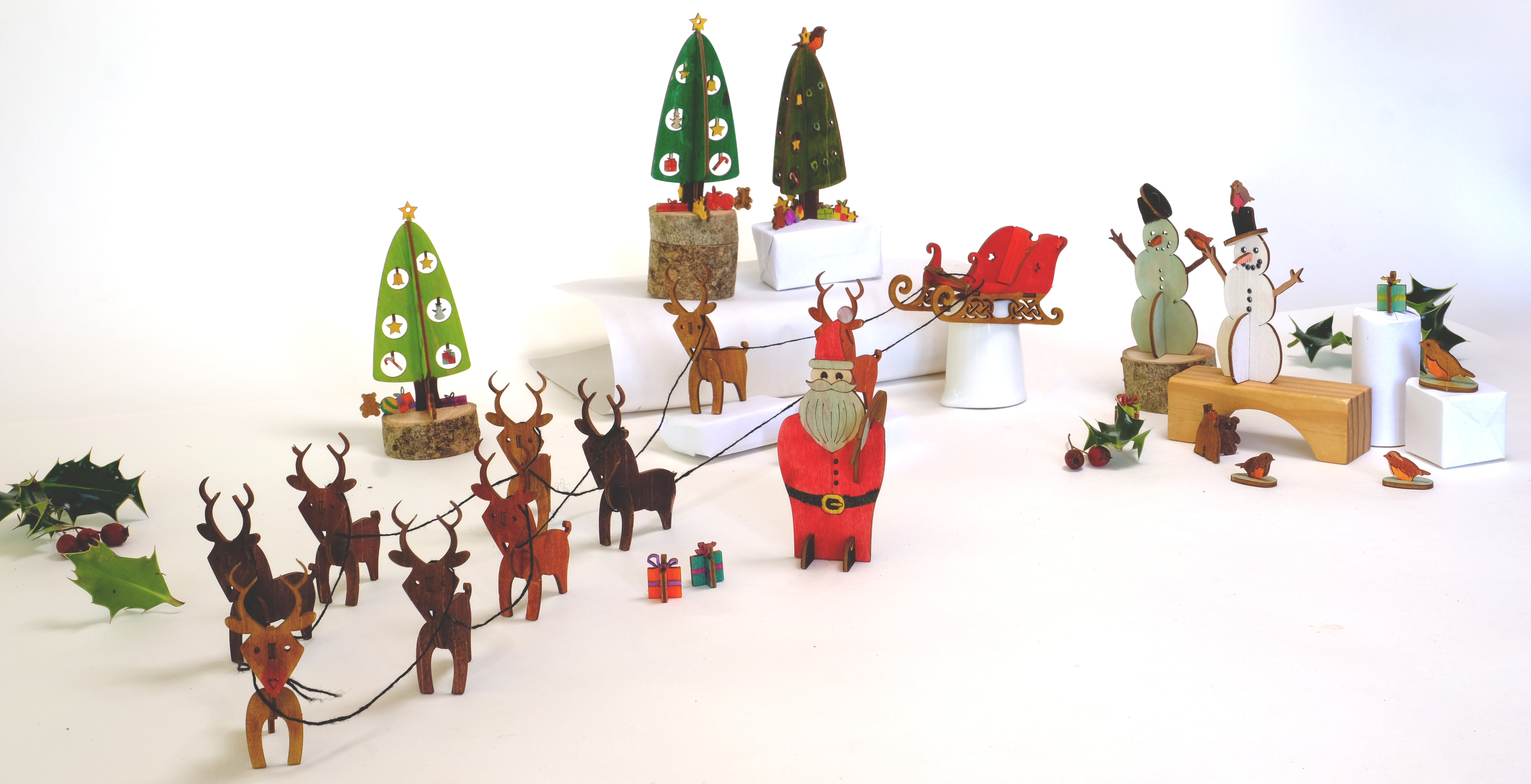 Complete set of eco-friendly wooden Christmas models – Santa, Sleigh, Snowman, Reindeer Pair, and Christmas Tree
