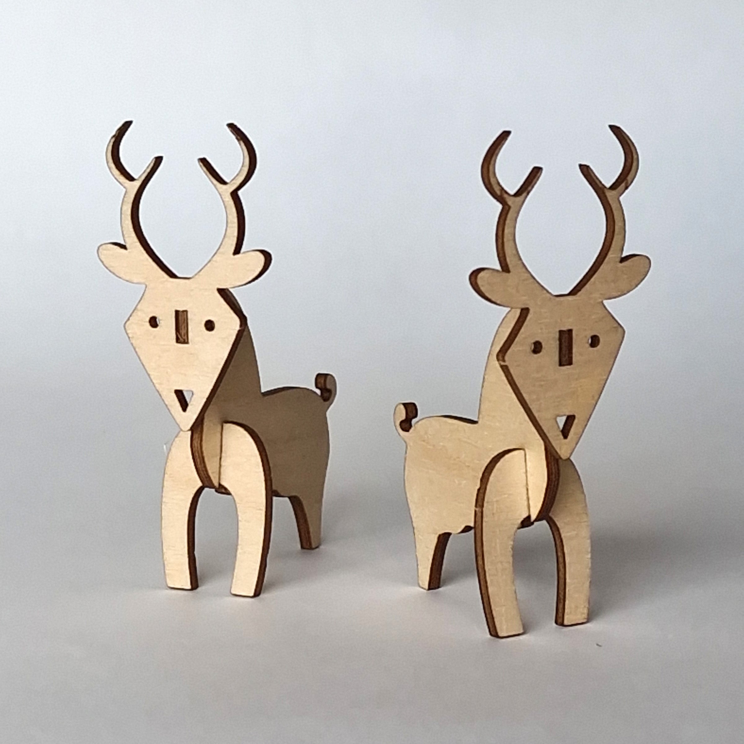 Wooden reindeer pair model, sustainable clip-together Christmas decor