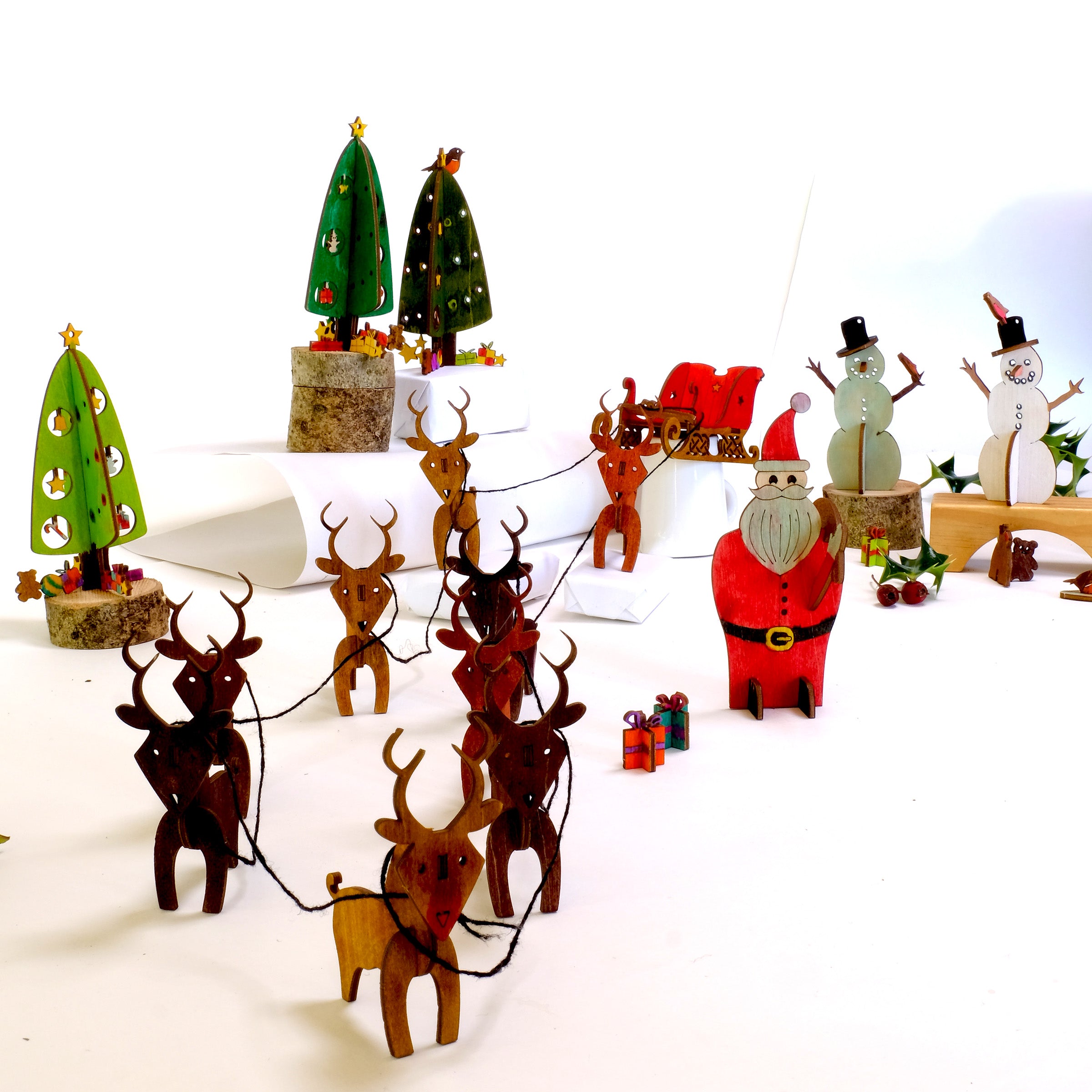 Complete set of eco-friendly wooden Christmas models – Santa, Sleigh, Snowman, Reindeer Pair, and Christmas Tree